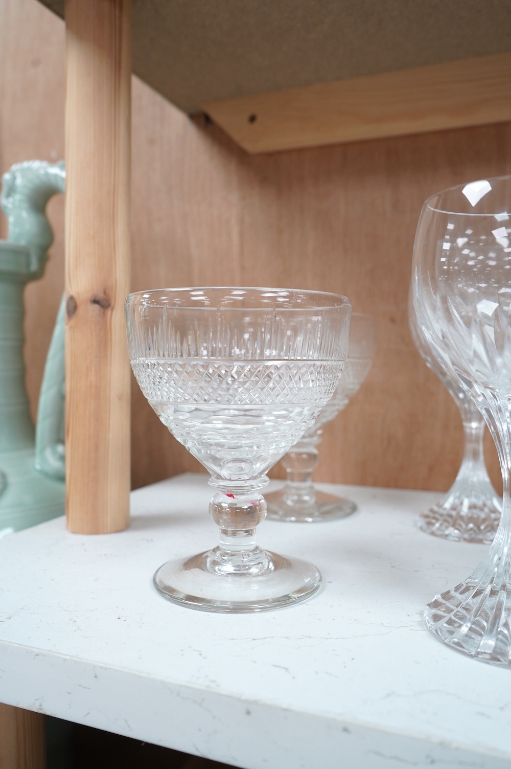 Three Baccarat (stamped) crystal ‘Massena’ cut glass wine goblets, a pair of late 19th century cut glass rummers and a set of six 20th century faceted wine glasses, Baccarat glasses 17.5cm high. Condition - good